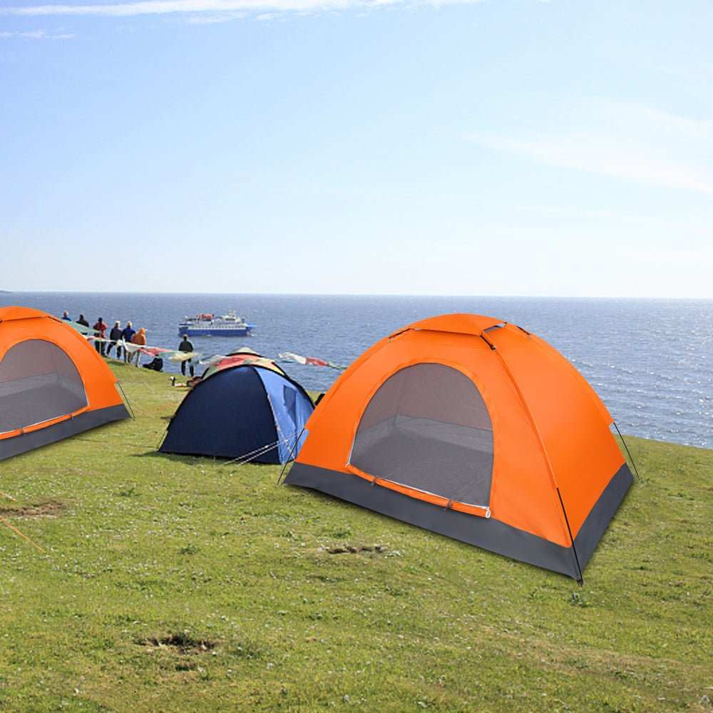 Lightweight waterproof camping dome tent in bright orange, easy one-second setup for backpacking.