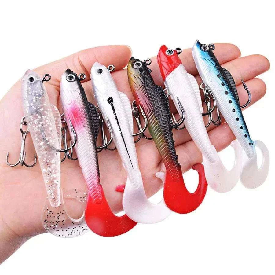 6-Pack soft silicone wobbler fishing lures in six vivid colors with 3D eyes and treble hooks, ideal for bass, pike, and carp fishing