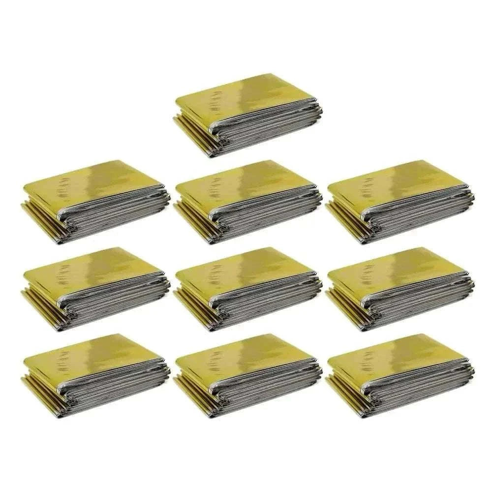 Compact emergency thermal blanket with gold and silver reflective surfaces, waterproof and windproof for outdoor rescue use