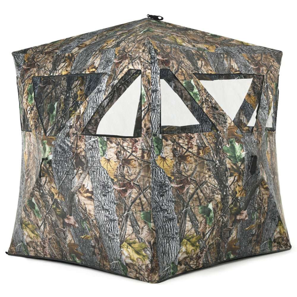Portable pop up ground hunting blind in jungle camouflage with three mesh windows and compact bag for easy transport and setup