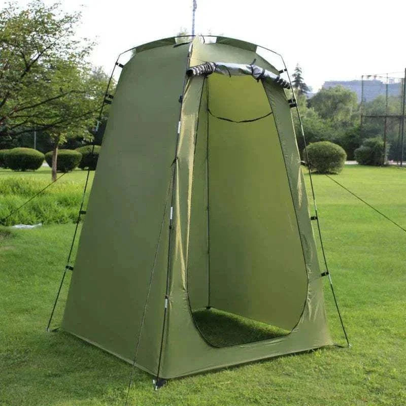 Portable privacy shower tent set up outdoors for camping and beach use