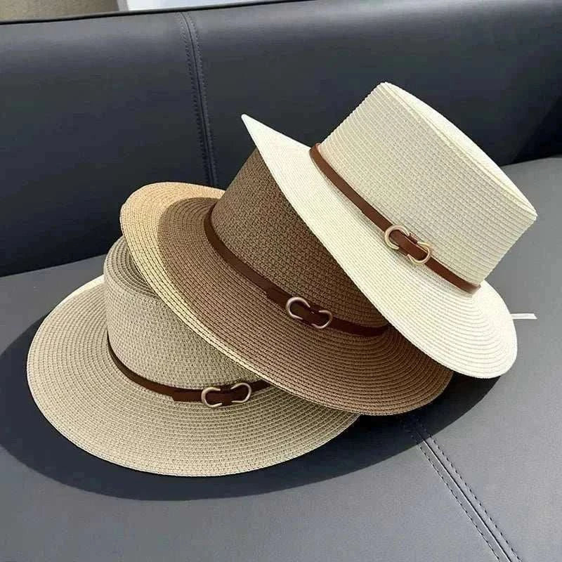 Straw sun hat for women with flat brim and bowknot, perfect for beach and summer style