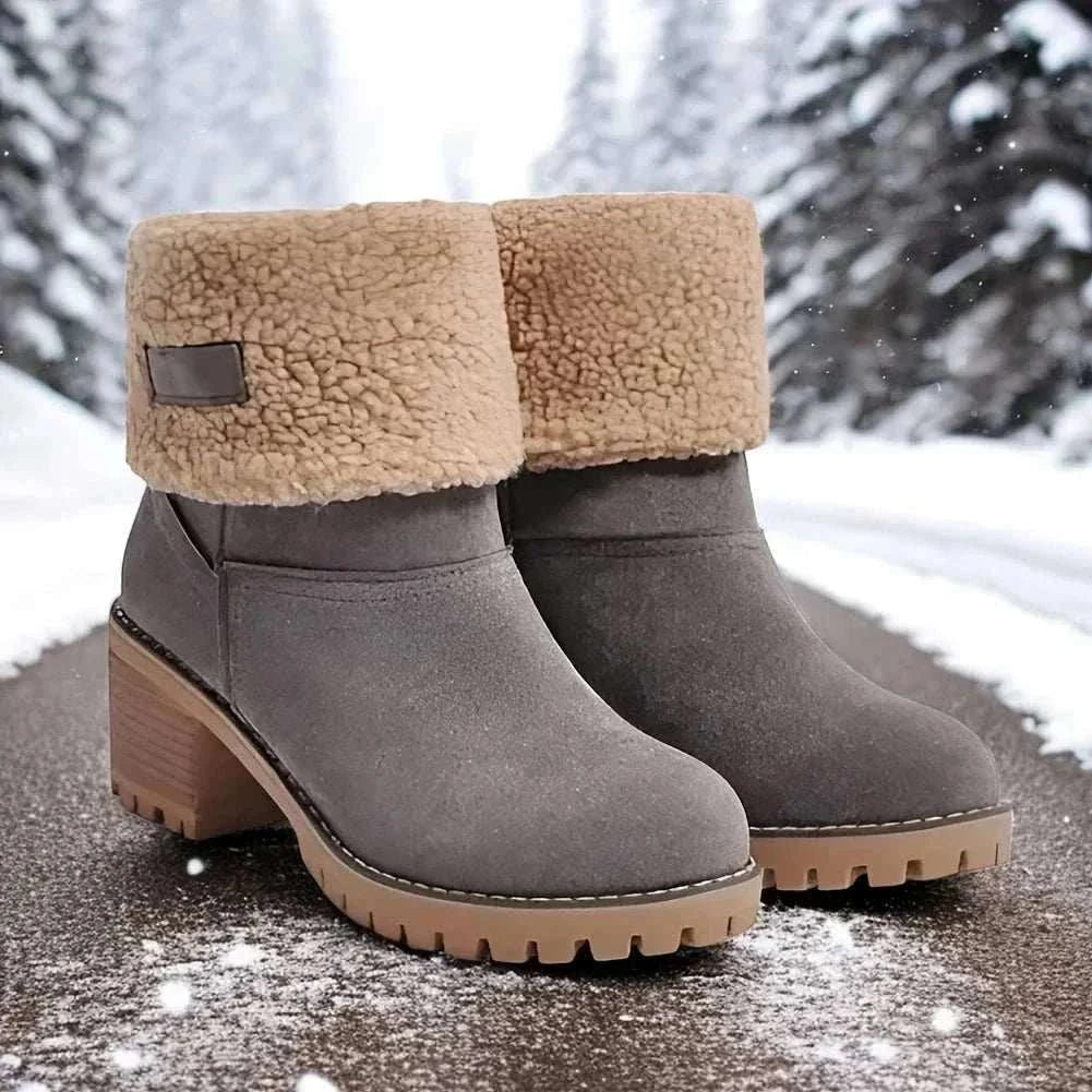 Women's winter faux fur snow boots with platform block heels and rubber outsole for traction