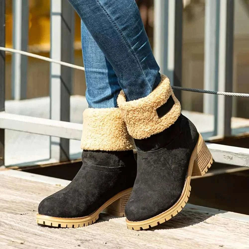 Women's winter faux fur snow boots with platform heels, plush lining, pull-on design, and rugged rubber sole for traction