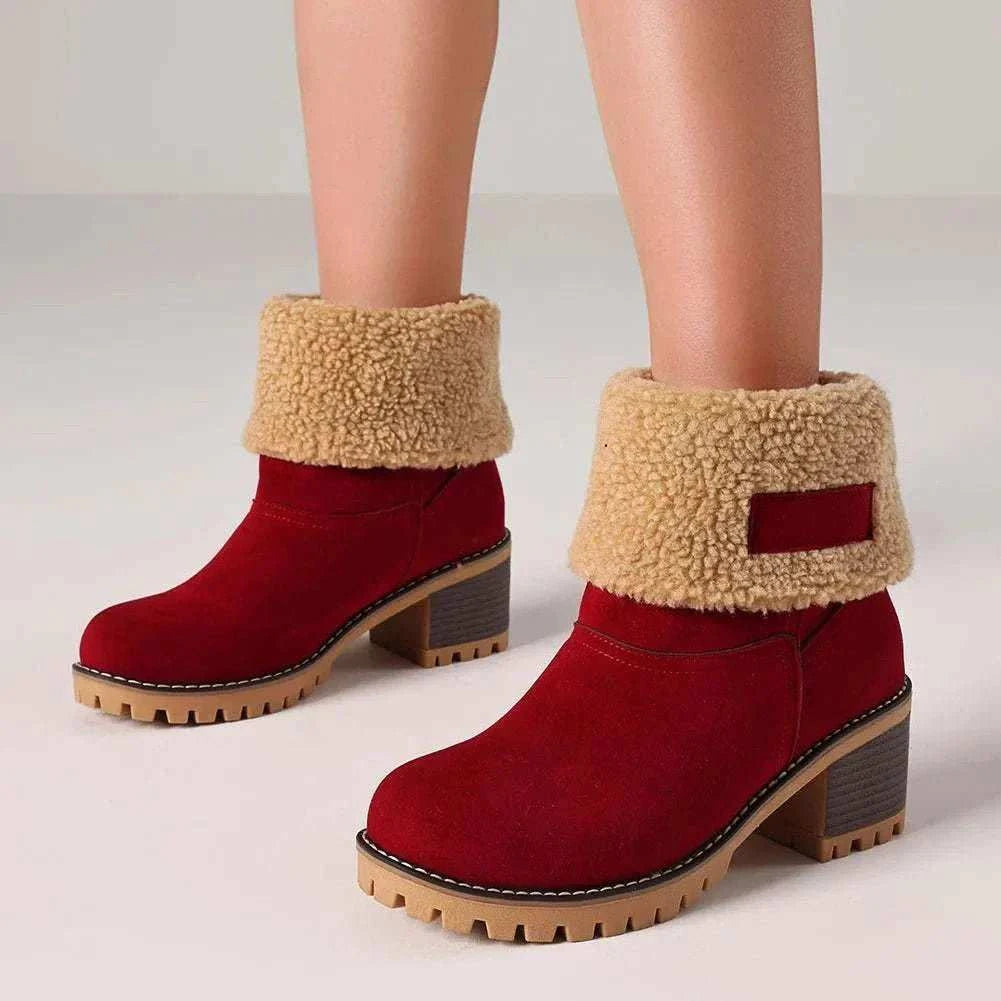 Women’s winter faux fur snow boots with platform heels and pull-on design