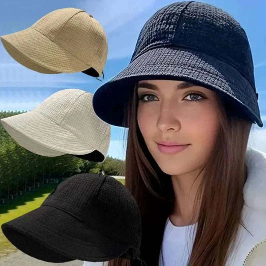Women wearing a foldable sun hat with wide brim for UV protection during outdoor hiking