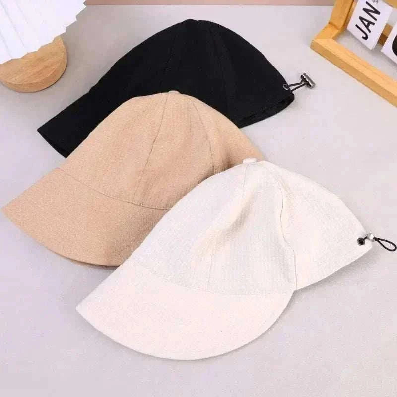 Woman wearing foldable sun hat with wide brim for UV protection during outdoor hiking